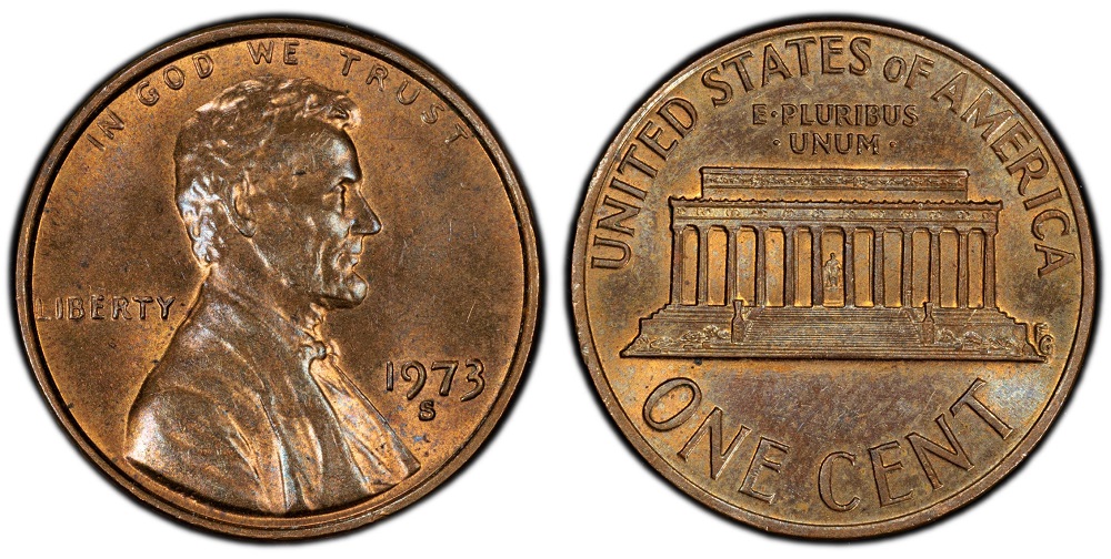1973 penny color comparison showing three specimens side by side: Red (RD) with bright copper luster, Red-Brown (RB) with mixed toning, and Brown (BN) with fully oxidized surface